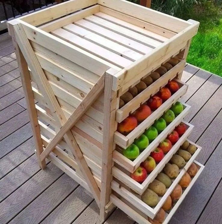Tiered timber produce rack holding fruit and vegetables