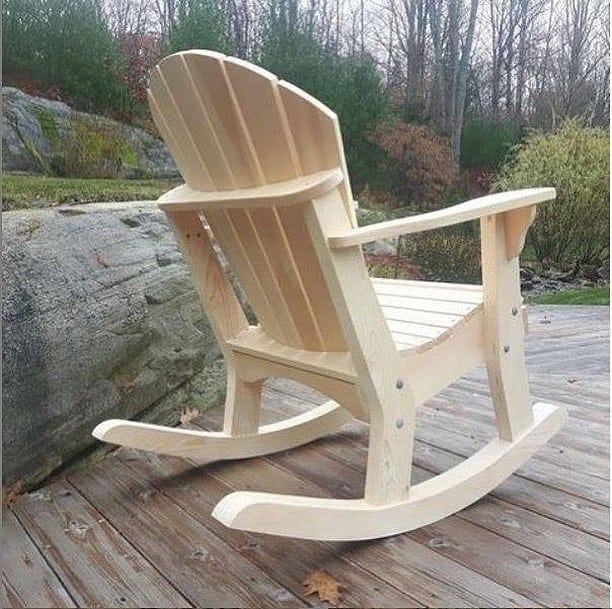 Slatted timber rocking chair on a deck
