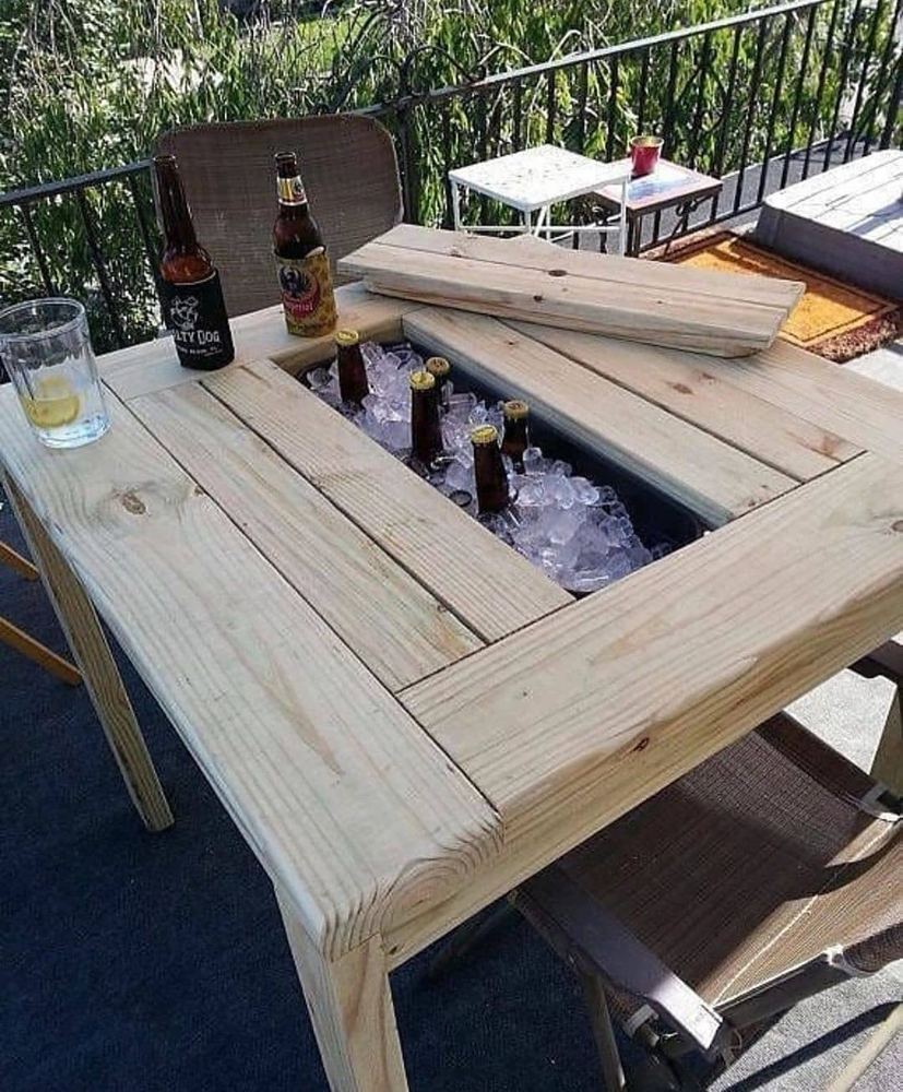 Patio table with a built-in ice trough for drinks